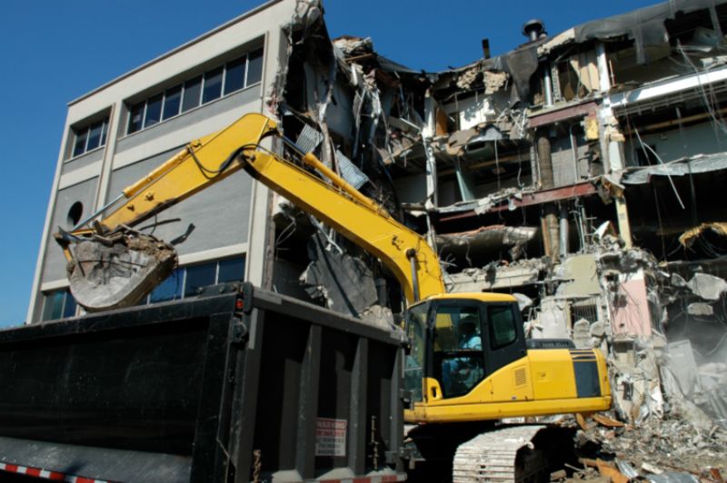 Demolition project job site with excavator